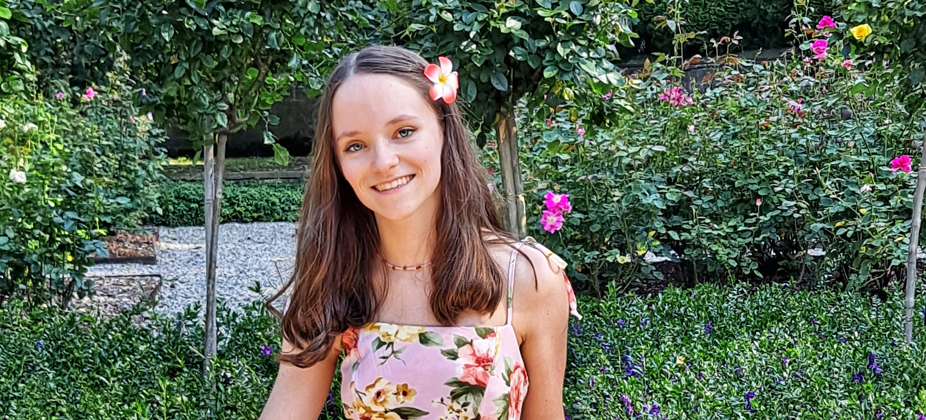 Emma, a girl with brown hair and blue eyes